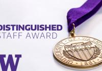 A bronze medal with the words University of Washington 1861 engraved on it and a purple ribbon attached to it sits atop a white background with the capital letter W in the lower left-hand corner and the words Distinguished Staff Award off to the left