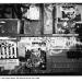 Image from FQ 73-3 page 71 Exterior wall with partially removed posters and graffiti, with caption reading, "Posters for 'The Hybrid State' film festival at Exit Art in 1991"